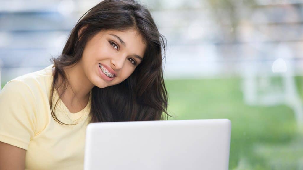 Girl on Computer photo